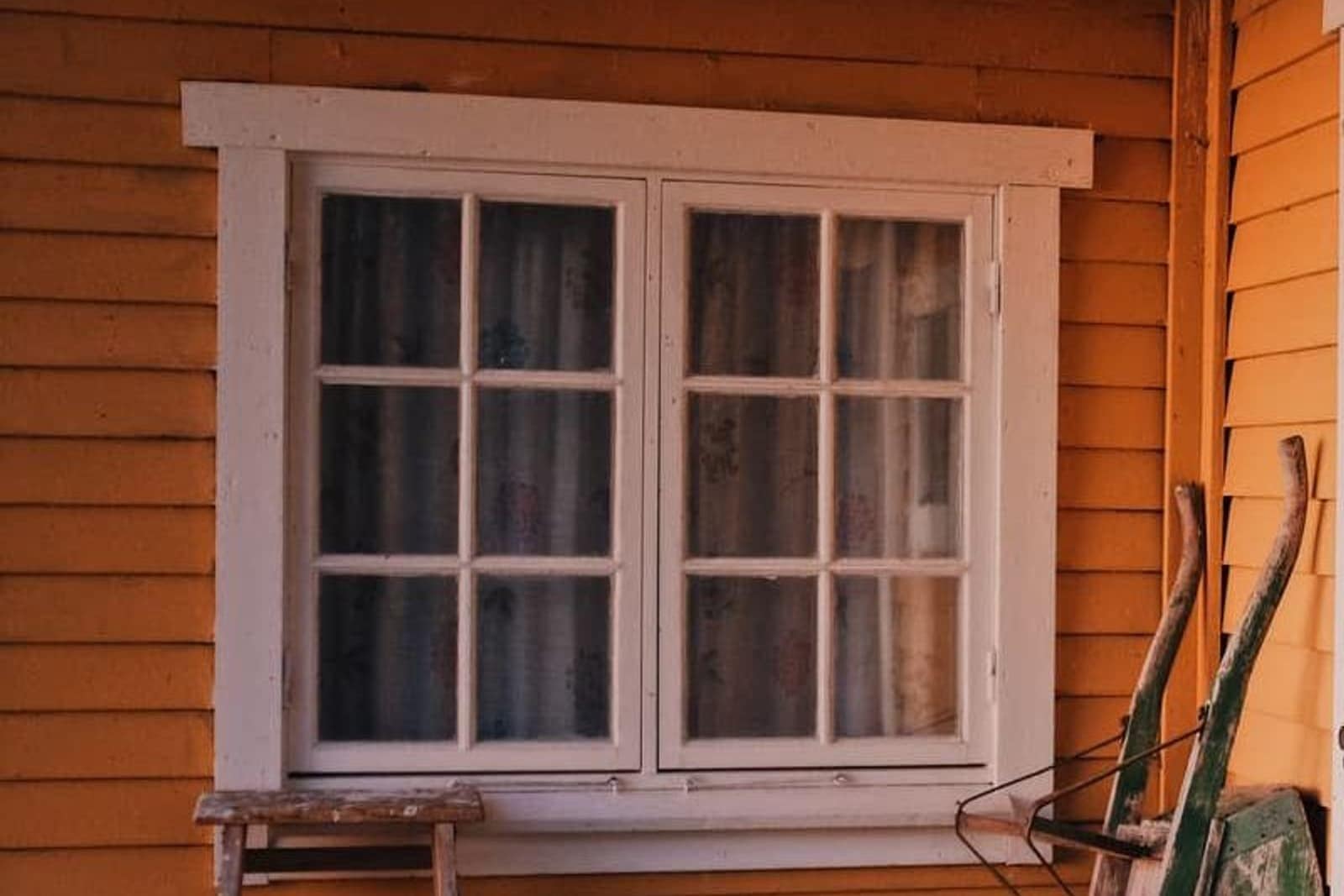 Framed multi-pane glazed unit set into a building, with its surround